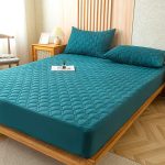 drap housse bleu canard et imperméable