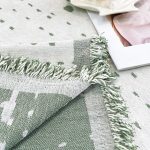 jeté de canapé élégant en vert sauge