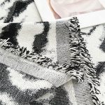 jeté de canapé en textile tigresse noir