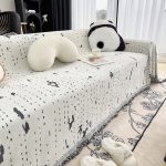 jeté de canapé motif éclaboussures noires