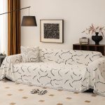 jeté de canapé tissé courbes écru