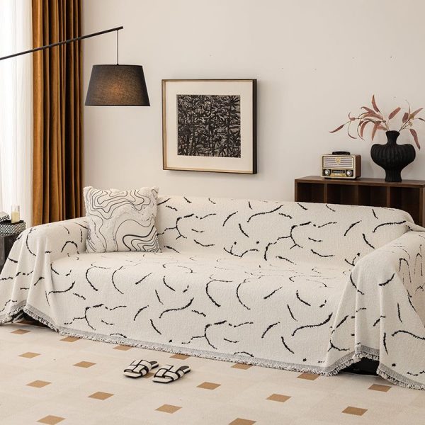 jeté de canapé tissé courbes écru