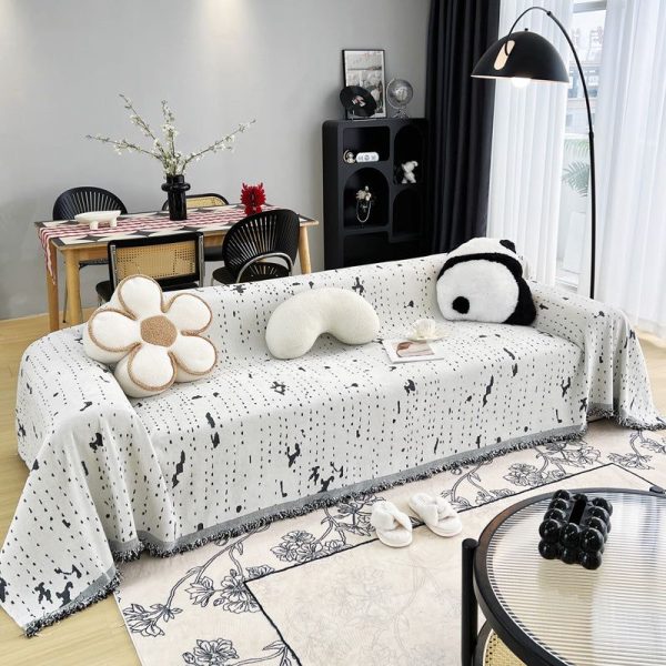 jeté de canapé tissé éclaboussures noires