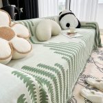 jeté de canapé vert en tissu tissé