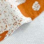 jeté de sofa en tissu orange