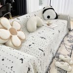 jeté déco tissé éclaboussures noires