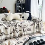jeté décoratif marron feuillage
