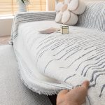 jeté décoratif tissé gris clair