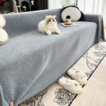 jeté élégant pour canapé gris