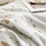 jeté textile tissé sable