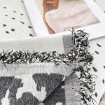 jeté tissé moderne éclaboussures noires