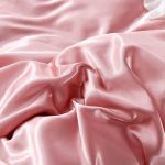 literie élégante rose pêche satin