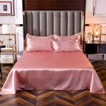 taies d'oreiller assorties rose pêche satin